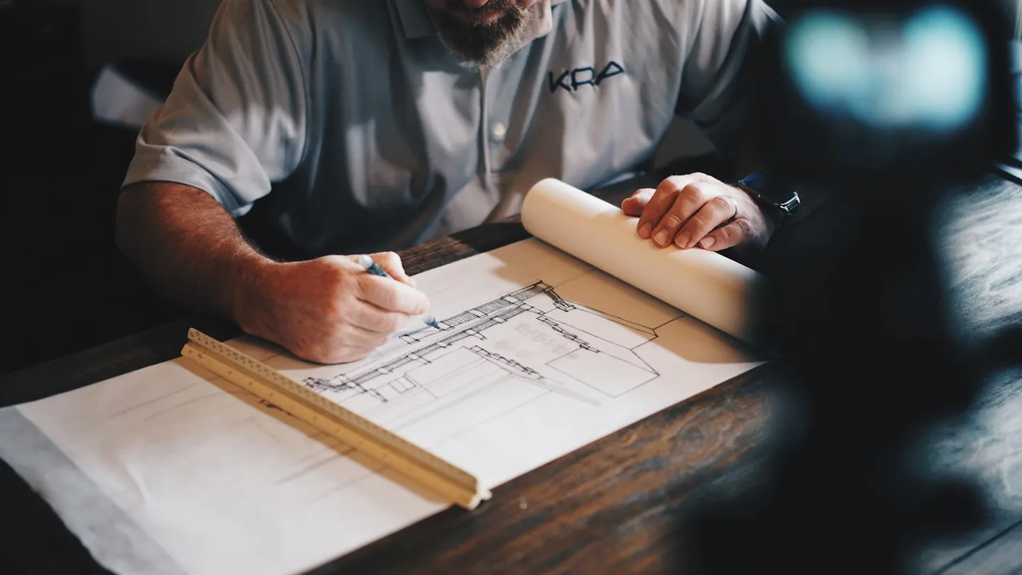 Technician drawing a design